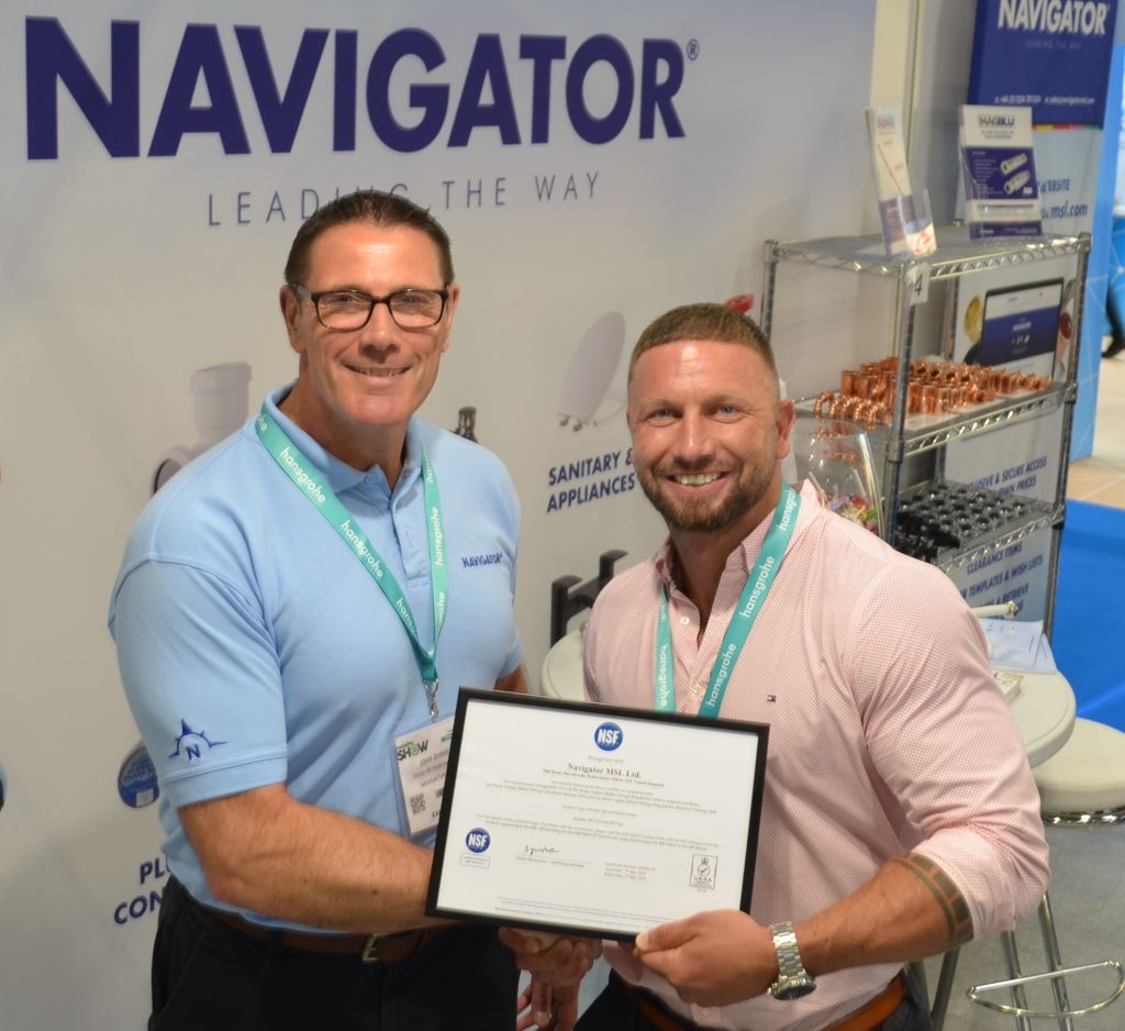 Luke Yates presents NSF certificate to John Byrne from Navigator Navigator achieves NSF REG4 accreditation for new Serpent Flexible Connector